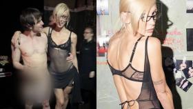 La bloguera Anastasia junto al rapero Ivleeva  Nikolai Vasilyev, en la fiesta 'de semidesnudos'.